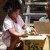 Little Girl Playing with Beer Bottles Little Girl Playing with Beer Bottles