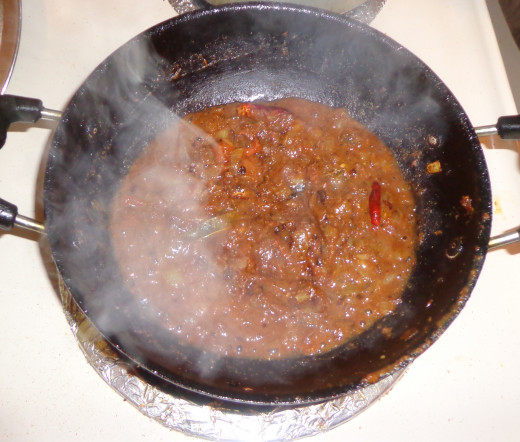 Little water is added for cooking
