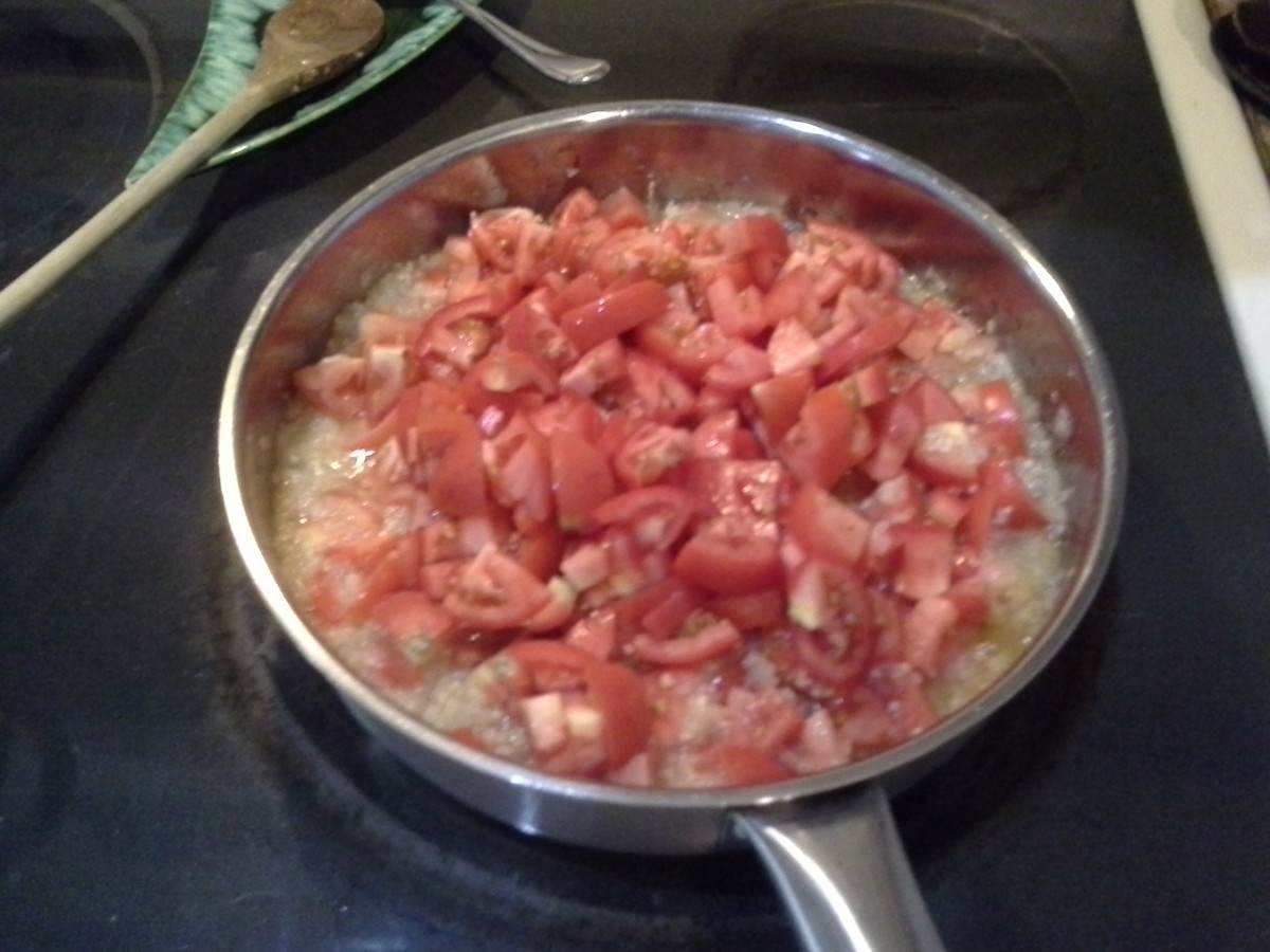 Step One: Cook your chopped onions, garlic, and tomatoes in olive oil