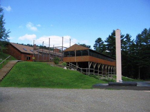 The main resort center (left) and presentation room (right) from the basketball hoops and loading dock. 2008