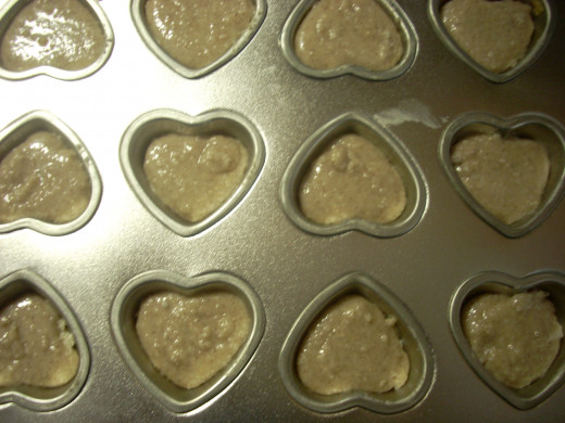 Molding the Coconut Butter and Cinnamon Valentine's Heart Candies