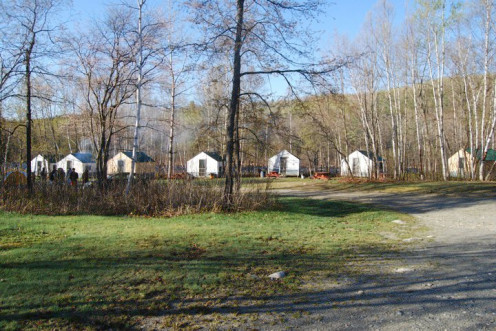 Looking at the cabin tents from Magic Falls' main entrance. Their headquarters are also located off to the right of the photo. 2010