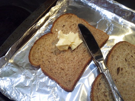 Step Three: Spread a thick layer of butter on each piece of bread