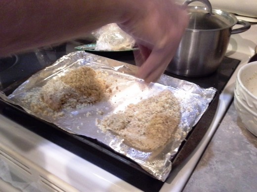 Step Twenty-two: Sprinkle your coated chicken breasts with your leftover butter