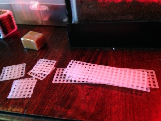Pieces to my butter toy, stacked neatly and by size.  The extra four square pieces were for the pats of butter on the end.