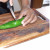 The first picture shows the washing of the peppers. The second pictures shows Hub cutting the pepper in the center. The third picture shows Hub removing the seeds. The first picture shows the washing of the peppers. The second pictures shows Hub cutting the pepper in the center. The third picture shows Hub removing the seeds.