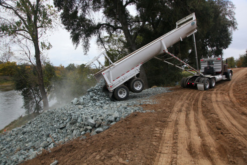 Many workers try to prevent erosion by placing rocks on slopes. Rocks keep the soil from sliding.