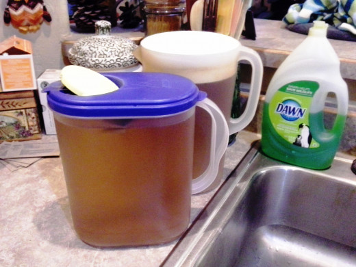 Step Seven: Cover with the pitcher tops while brewing