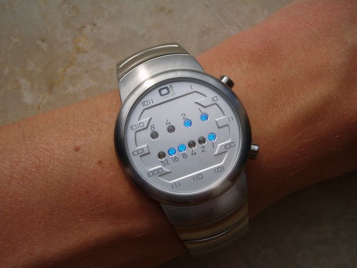 A Binary Watch.  The top line is the hours - 3. The bottom the minutes - 25.  The time is therefore 3:25. 