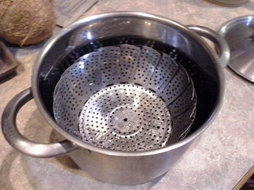 Step Two: Place a steamer basket into your pot