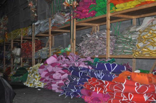 More than a thousand flowers are made by Blaine Kern Studios throughout the year, sorted by color and style, ready to be afixed to their float
