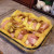 Step Twelve: Then cover the top of your casserole with just a little bit of teriyaki sauce for taste