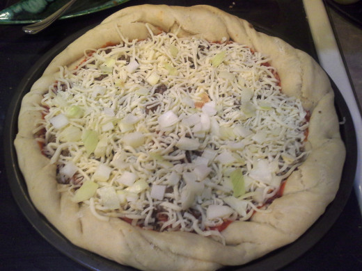 Step Eighteen: My husband decided that he wanted to add onion and red pepper slices, so I chopped some up for him