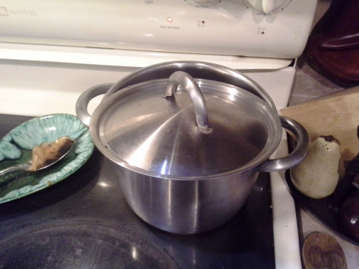 I also put the cover back on, but not completely to block the boiling water from splashing out.