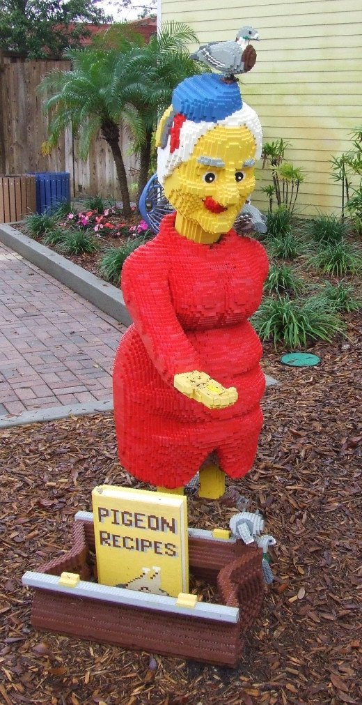 A subtle statue of old lady feeding (and preparing to feed on) pigeons.