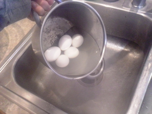 Step Three: Boil your eggs and then drain them in the sink