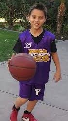 My son Ari ready for his first Jr. Lakers game at the YMCA.