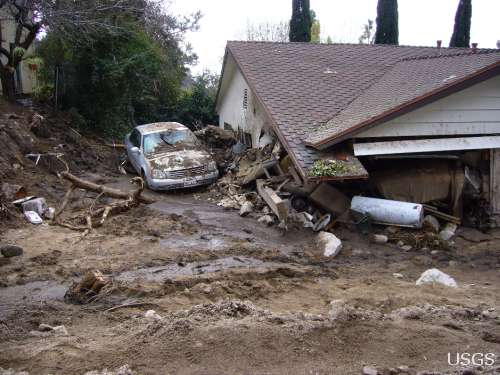 House damaged during a debris flow in February 2010.