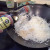 Step Seven: Now add your soy sauce to your rice