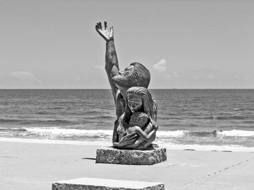 Tribute statue to victims and survivors of local hurricanes.