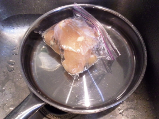 Step One: Partially thaw your chicken (my husband wanted to thaw it in room temperature water)