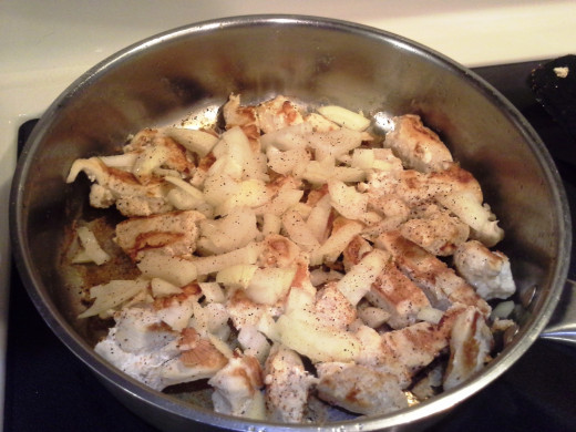 Step Thirteen: Season the other side of your chicken, and your onions, with your season-all