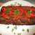 Garnish the nut roast with the bell pepper and parsley as illustrated. Nut roast can be eaten hot or cold. Garnish the nut roast with the bell pepper and parsley as illustrated. Nut roast can be eaten hot or cold.