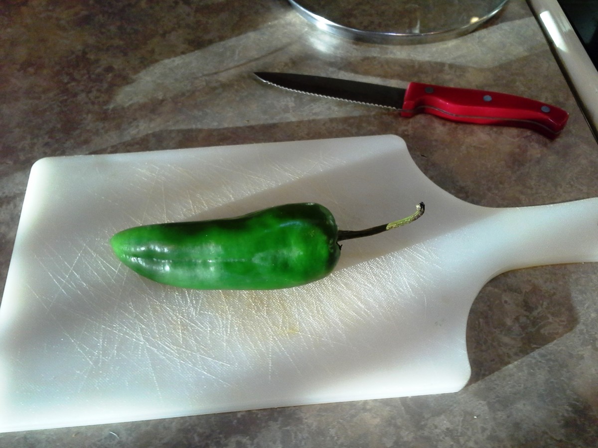 Step Five: Pull out an Anaheim pepper and prepare a cutting board and knife