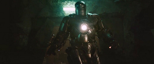 This was initially his "Ticket out of here..." .   But it became far more than that-- rapidly.  Upon finding Yinsen dying, and realizing Yinsen, GAVE his life for him, giving him a chance to live... Stark begins to change...