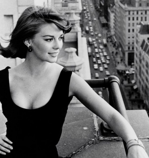 Lovely Natalie Wood shows off her shoulders in a sleek scoop neck and studs. 