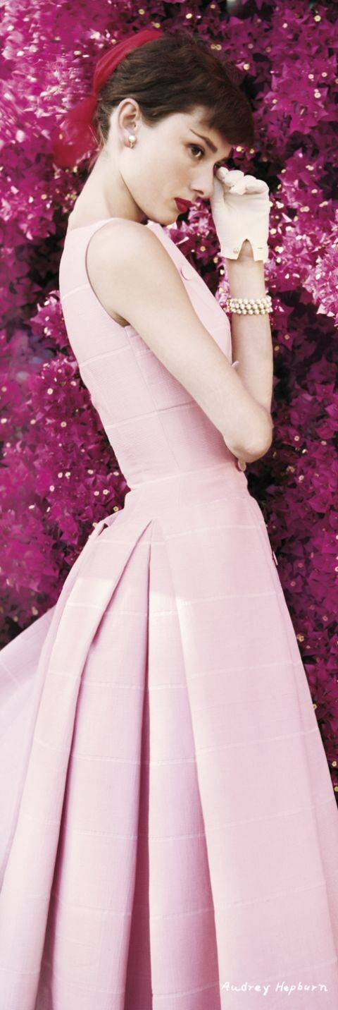 Radiant Audrey.  Is there anything more lovely than this shell pink frock?  And of course, the pearls just set off the creaminess of her complexion...