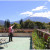 Andy on the rooftop terrace pointing at Volcan Agua Andy on the rooftop terrace pointing at Volcan Agua