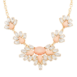 Lush pairing of pink, silver, and gold tones, shimmering together in the Aurelia necklace. Oval, marquis, and teardrop stones combine for a stunning floral display. 