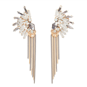 Translucent marquee crystals fan out to form Nicolette's dramatic design, complemented by contrasting chain tassels. These evening- ready stunners will wow at your next occasion