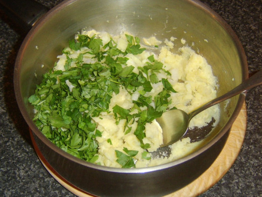 Mixing potato cake ingredients