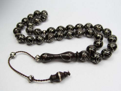 The tesbih has 33 beads on a string. Prayed 3 times.