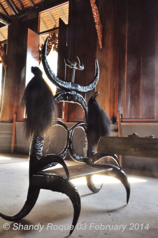 Baan Dam, Chiang Rai. The main house contains a dark-colored seat made of buffalo horns and animal hair.