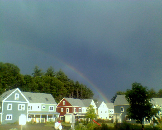 Summer rains bring rainbows of hope ~ a double rainbow over our co-housing village.