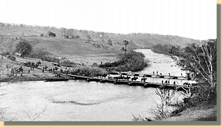 Cavalry crosses a pontoon bridge over the Rapidan River in Virginia