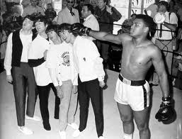 The Beatles take a straight right from the wonderful Muhammad Ali ( Cassius Clay ).