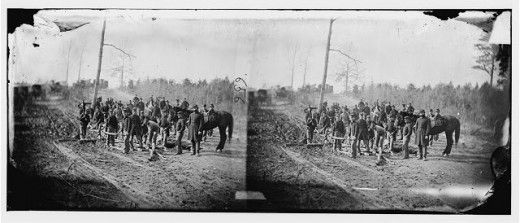 Stereo photograph that shows engineers in the act to corduroy a road