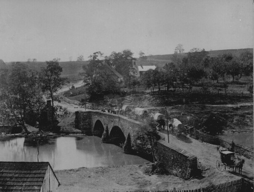 Supply wagons pass over Antietam Creek via a stone bridge