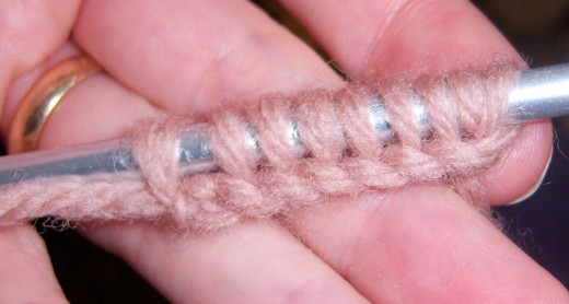 A series of cast on knit stitches.