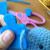 Slipped yarn through side of puzzle piece.