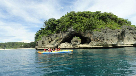 Riding a boat to hop around the island
