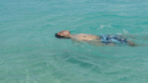Enjoying the crystal clear blue water at Pukka