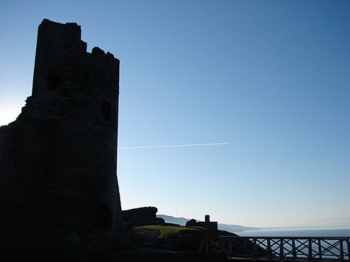 The ruin of Aberystwyth Castle silhouetted against the sky