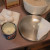 Use a paper towel to spread about a tablespoon of solid vegetable shortening around the cake pan. Use a paper towel to spread about a tablespoon of solid vegetable shortening around the cake pan.
