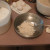 Sprinkle about 2 Tablespoons of flour into the pan and shake it around to all parts Sprinkle about 2 Tablespoons of flour into the pan and shake it around to all parts