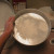 Shake the flour around to coat the bottom and sides of the pan Shake the flour around to coat the bottom and sides of the pan